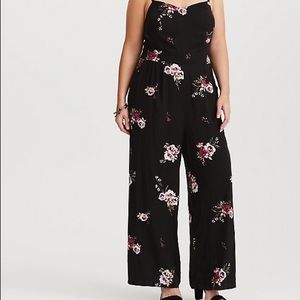 Black floral print jumpsuit.